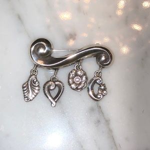 Vintage Brighton pin with charms